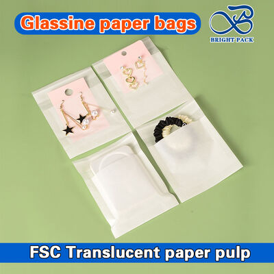 Προσαρμόσιμες βιοαποδομήσιμες διαφανείς σακούλες από γυάλινο χαρτί για συσκευασία φιλικών προς το περιβάλλον ενδυμάτων